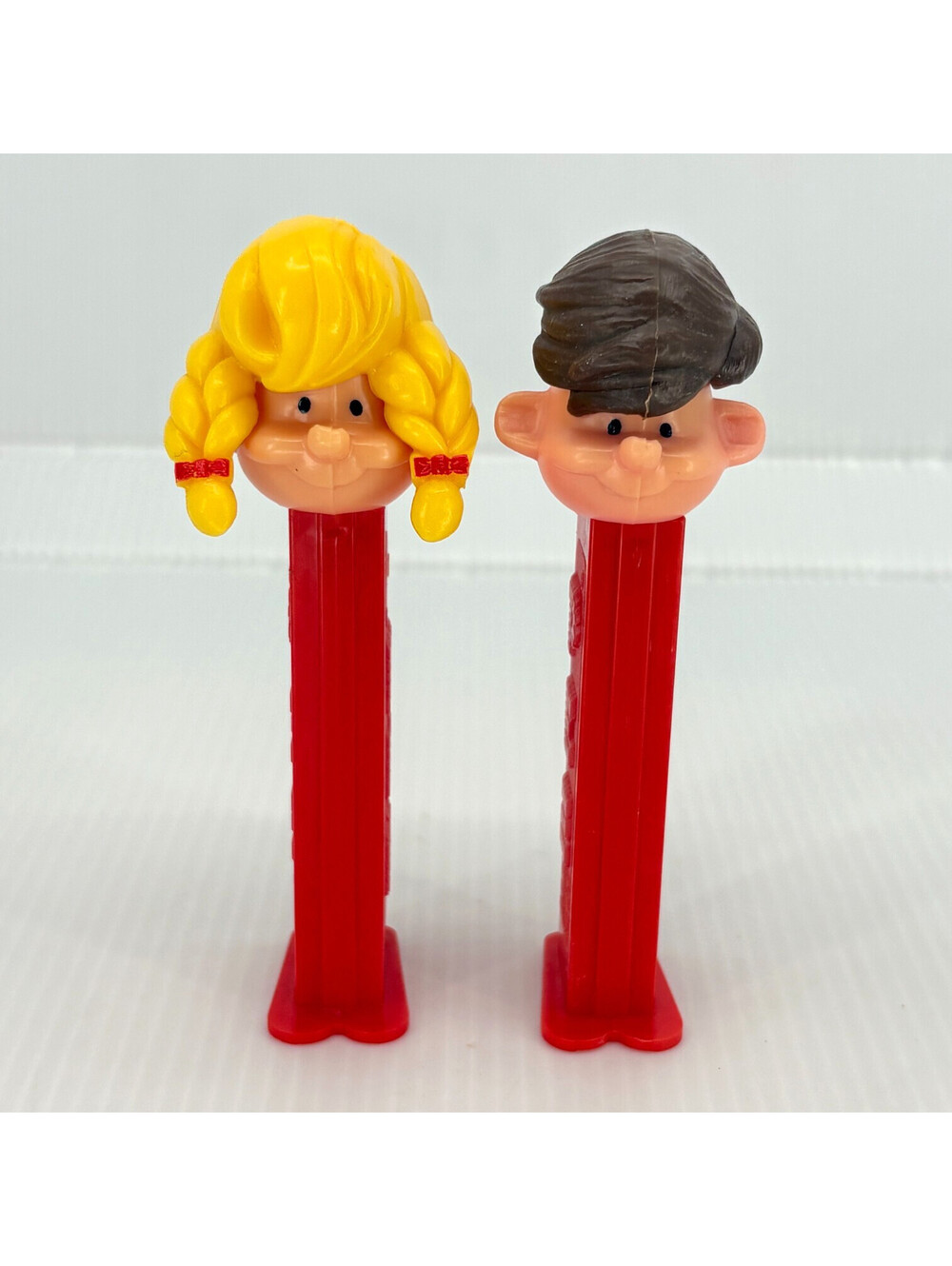 PEZ Boy Girl Character Candy Dispensers Lot Of 2 Red Stems Made In Hungary